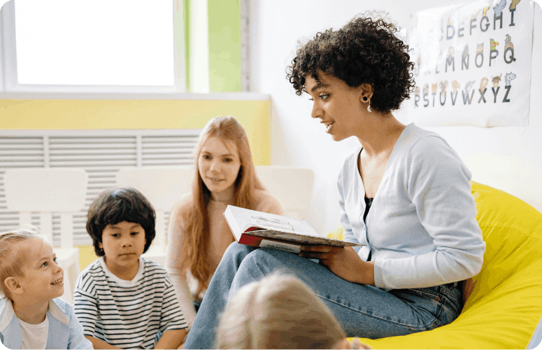 Teacher reading to children